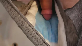 bisexual guy pisses in his diaper then jerks and cums
